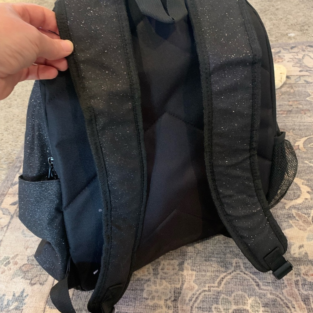 Durable Black Backpack With Multiple Compartments - image 2